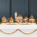 Beleuchtetes Holz-Weihnachtsdorf - Kaminsims-Dekoration mit LED-Häuschen