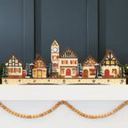 Beleuchtetes Holz-Weihnachtsdorf - Kaminsims-Dekoration mit LED-Häuschen