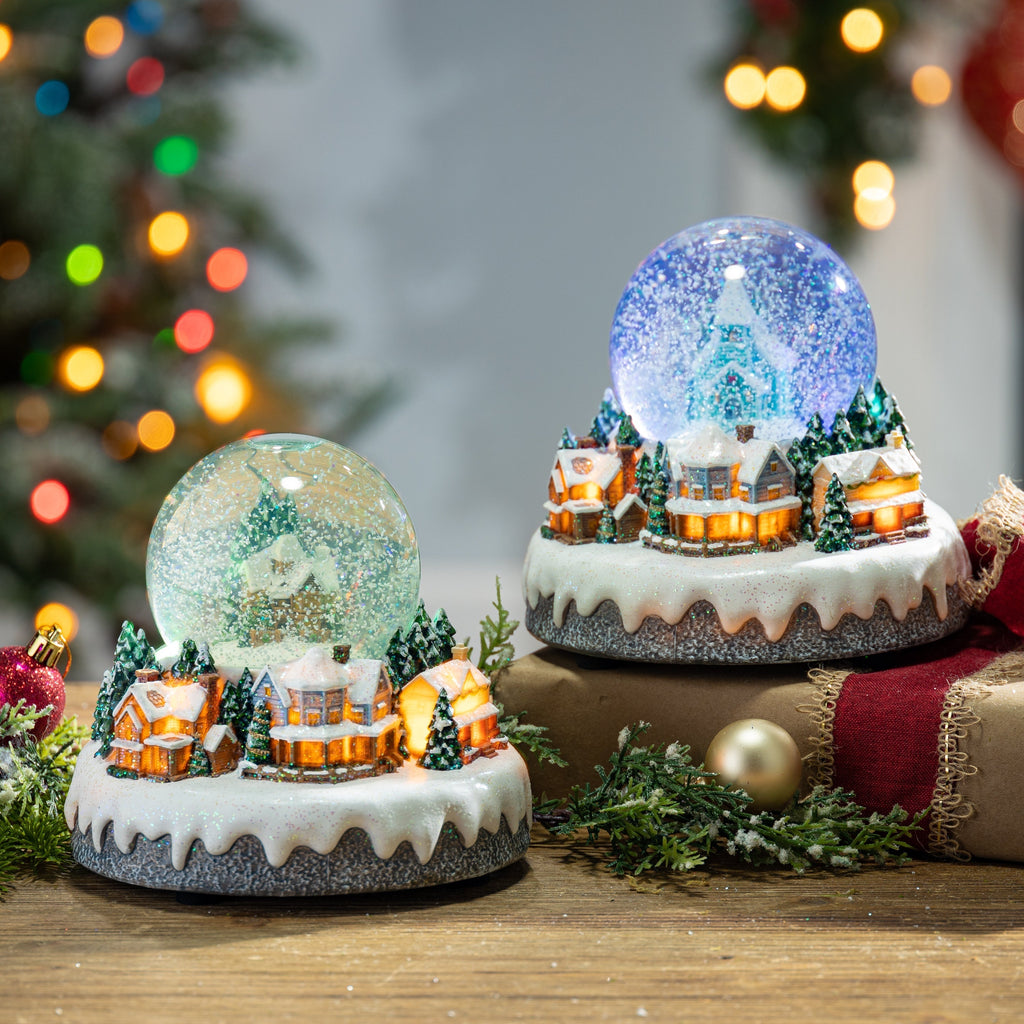 Musikalische Schneekugeln mit Beleuchtung - Set mit 2 Weihnachtsdörfchen